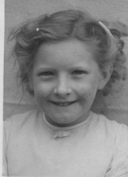 Ann b-1949 with hairgrips.jpeg